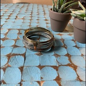 Bundle of silver and gold bangles